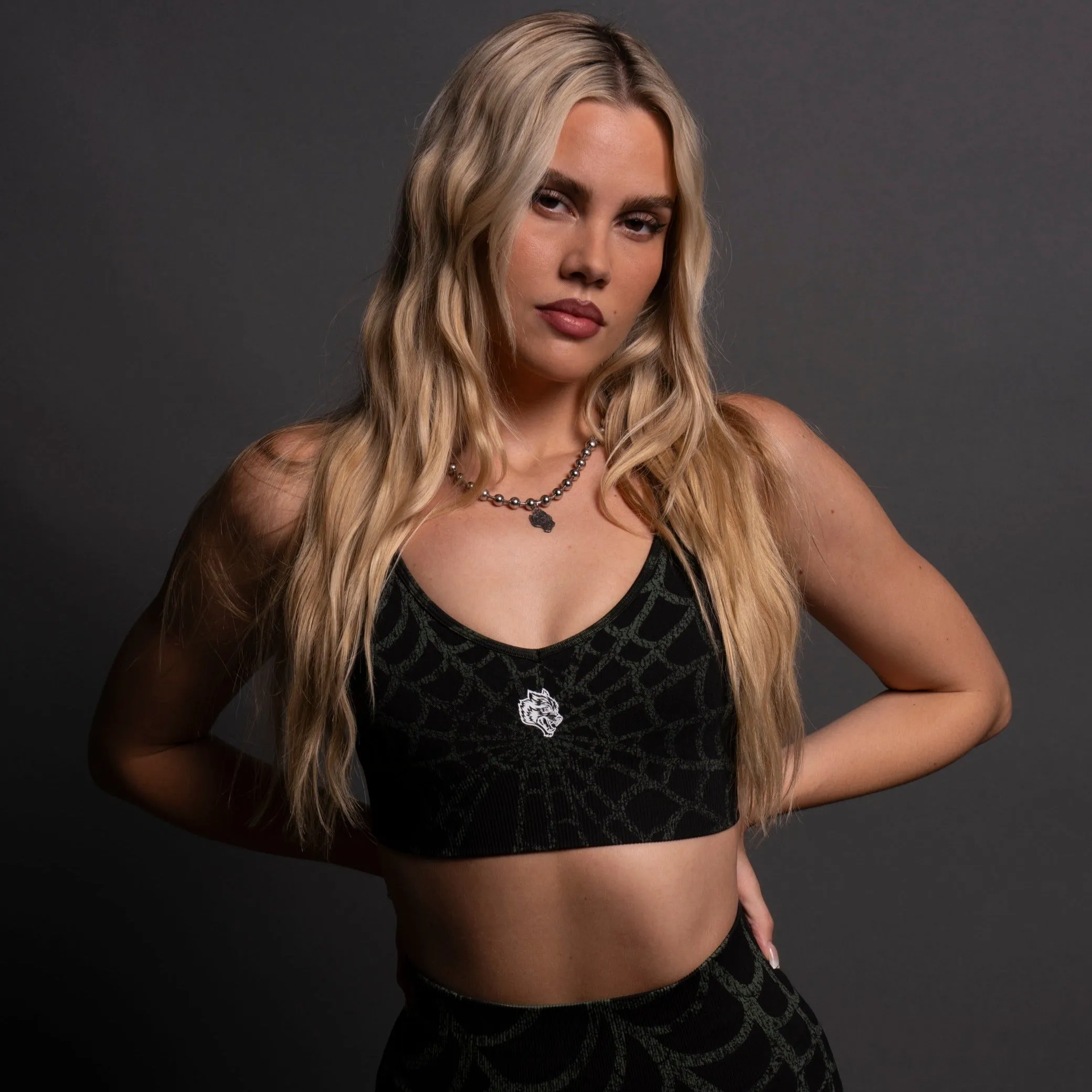 Hesh "Everson Seamless" Sports Bra in Black/Green Symbiote Web